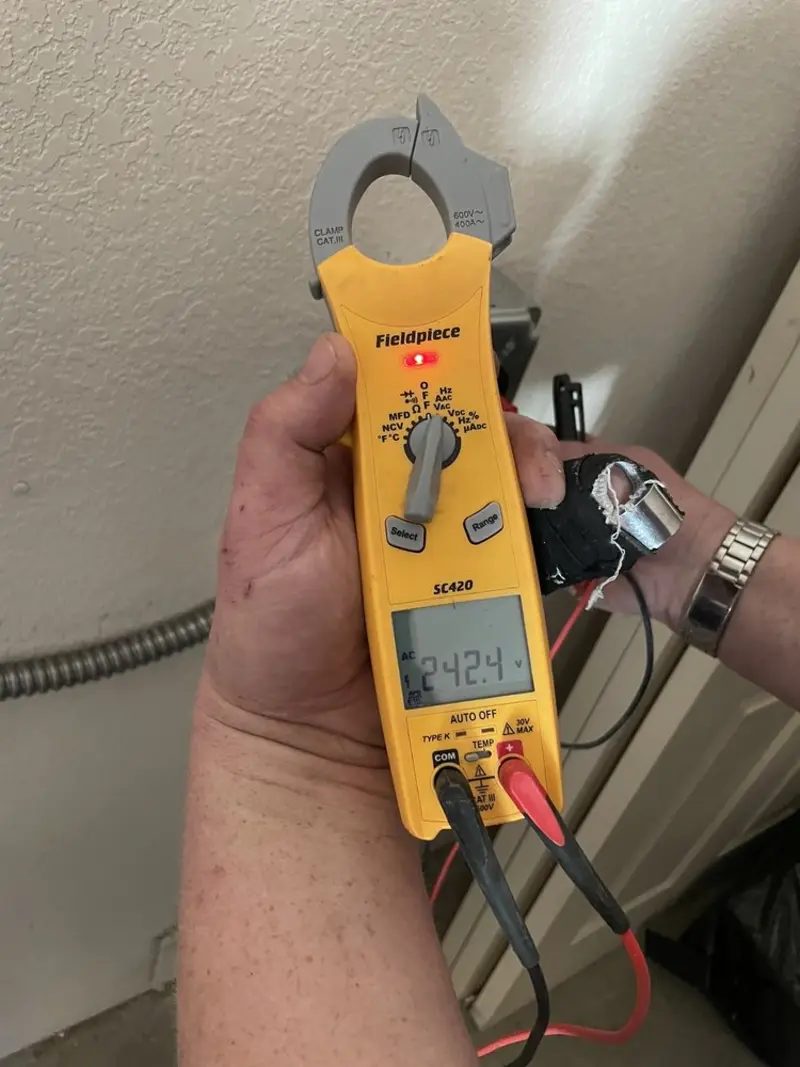 Voltage testing with clamp meter during Aluminum Wiring Replacement in Greenhills